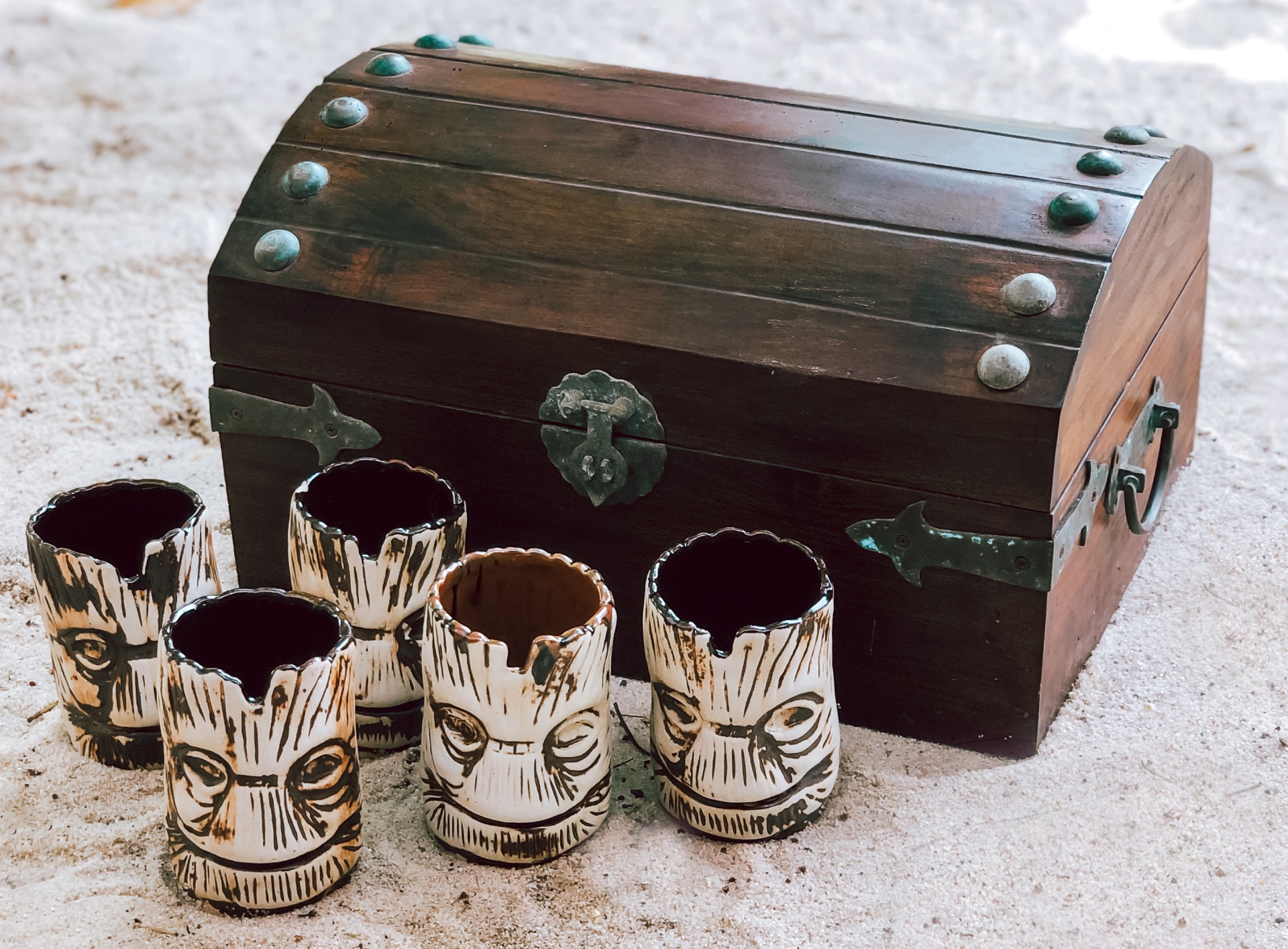 Treasure chest with tiki mugs